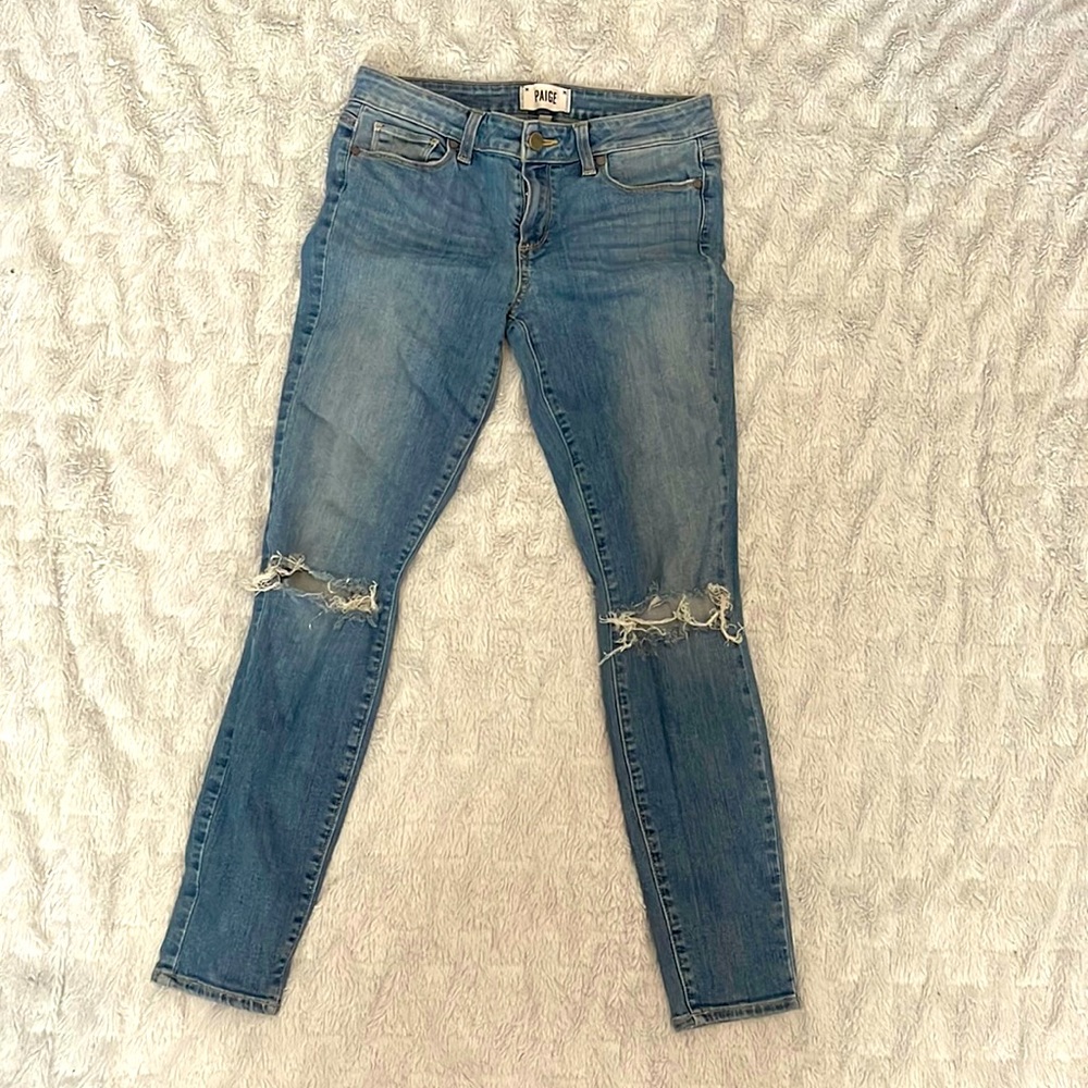 Paige mid rise skinny jeans with holes in knees.